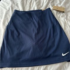 Nike Golf Skirt W/ Built In Shorts. Nwt!! Never Worn Nike Sporty Short Skirt, Casual Nike Tennis Skirt, Nike Fitted Skirt, Nike Stretch Lined Skirt Bottoms, Casual Nike Sports Skirt, Nike Casual Sports Skirt, Casual Nike Tennis Skirt With Lining, Nike Casual Short Skirt, Casual Short Nike Skirt