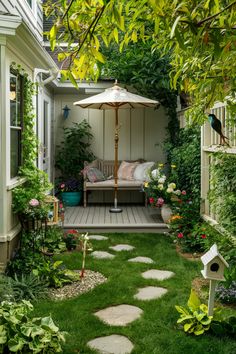 Tranquil garden with a cozy patio bench, umbrella, stepping stones, lush plants, and birdhouse. Small Outside Sitting Area Ideas, Awkward Backyard Space Ideas, Small Italian Garden Ideas, Backyard Reading Nook, Square Backyard Ideas, Small Backyard Lighting Ideas, Mini Garden Ideas Small Spaces Outdoor, Tiny Backyard Oasis, Small Narrow Backyard Ideas