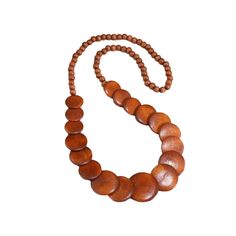 PRICES MAY VARY. Tribal Wood Beaded Necklace -- The perfect handmade wooden necklace that can be worn in many ways. It is very light and will not be any burden at all. Pure natural wood, feel the breath from nature. Strong resort style, have fun and create your own unique style. Material -- Natural Wooden beads, hypoallergenic. From design to material selection to production, we strive for excellence. Our designs are not only decorative, but also finely crafted. Simple Style -- Size to size, wit Vacation Jewelry, Wood Bead Necklace, Wooden Necklace, Beaded Statement Necklace, Choker Collar, Bib Necklace, Resort Style, Beach Inspired, Bead Designs