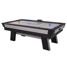 an air hockey table with lights on it