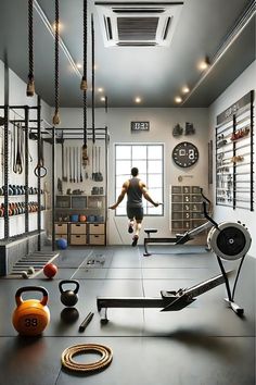 a man is running through a gym with equipment on the floor in front of him