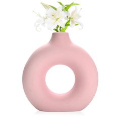 PRICES MAY VARY. Product advantages: The light pink with the donut shape makes it easier for you to like this vase. pure ceramic production. Anti-breakage packaging. Modern minimalist design style, go great to anywhere. Decorative Matching: This donut vase is perfect for fresh flowers, dried flowers, buds, artificial flowers and plants decoraitons, or with pampas grass and other decorative plants Decor options: circle vase for entryway, living room table decor, mantle, farmhouse, shelf decor, co Donut Vase, Vase Modern, Matte Ceramic, Office Home Decor, Dining Table Centerpiece, Entryway Living Room, Office Home, Ceramic Vase, Living Room Bedroom