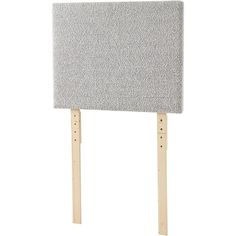 a gray headboard with wooden legs on a white background, it is made out of foam