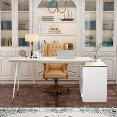 a desk with a laptop on it in front of a bookcase and bookshelf