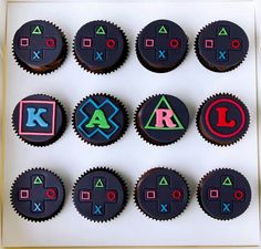 decorated cupcakes in the shape of video game controllers