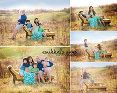 a family sitting on a bench in a field