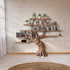 a living room with a tree shaped book shelf on the wall next to a round rug