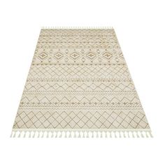 a beige and white rug with fringes on the bottom, in front of a white background