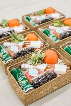 four trays filled with assorted fruits and veggies on top of each other