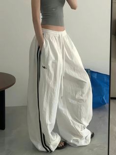 49331302629658|49331302662426|49331302695194|49331302727962 White Full-length Parachute Pants For Streetwear, Casual White Parachute Pants, White Full Length Parachute Pants For Streetwear, White Casual Full-length Parachute Pants, Casual White Full-length Parachute Pants, White Stretch Y2k Bottoms, Y2k Wide Leg Cotton Sweatpants, White Baggy Parachute Pants For Loungewear, Baggy White Leisure Pants