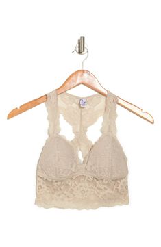 A sultry floral lace bralette with a back cutout offers a sophisticated style that can be worn as bold standout piece or a supportive underwear. V-neck Shell: 86% rayon, 14% spandex; lining: 95% polyester, 5% spandex Hand wash, dry flat Imported Chic Lace Crop Top Bra Friendly, Chic Lace Bra With Lace Trim, Chic Lace Bra With Lace Closure, Lace Bra With Lace Closure For Night Out, Fitted Lace Bra With Lace Top, Spring Lace Bra For Night Out, Fitted Low-cut Lace Bra, Chic Fitted Bra With Delicate Lace, Spring Lace Bra With Lace Closure