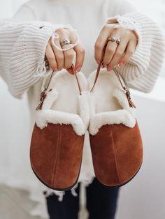 Step into comfort with our cozy sheepskin suede clogs, the perfect outdoor mules for chilly days. These warm slippers feature luxurious fur lining, making them ideal for winter wear. Designed for both style and practicality, these cute women's shoes are a thoughtful gift for her. Enjoy the perfect blend of warmth and fashion with every step! Material: high-quality soft suede leather and fur Size: EU 36-41 / US 5.5 - 10 Estimated shipping time: Europe 7-14 days US 7-14 days Asia 7-20 days Other country 7-21 days See more great shoes in our store : https://www.etsy.com/shop/MxBrandUA?ref=seller-platform-mcnav Comfortable Slip-on Mules For Fall, Winter Closed Toe Clogs With Textured Footbed, Winter Suede Slippers With Cushioned Footbed, Comfortable Closed Toe Clogs With Suede Lining, Comfortable Winter Mules With Suede Lining, Suede Slippers With Plush Lining And Round Toe, Winter Suede Clogs With Rubber Sole, Winter Suede Clogs With Textured Footbed, Comfortable Winter Clogs With Textured Footbed