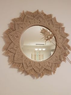 a mirror that is hanging on the wall