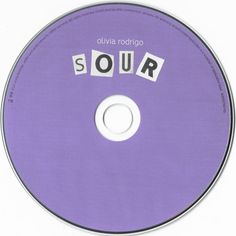 a purple disc with the word sour spelled in white letters on it's side