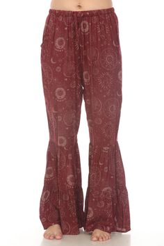 Find your sense of bohemian elegance with our Celestial Flowy Ruffle Hem Pants. These pants combine a light and comfortable fabric with a vibrant celestial print style and feature two front hand pockets as well as an elastic waist with a draw string for a comfortable fit. They are the perfect addition to any free spirit's wardrobe. Celestial Print, Pants Boho, Hem Pants, Ruffle Design, Yoga Dance, Ruffle Pants, Flowy Pants, Front Hand, How To Hem Pants