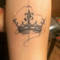 a tattoo with a crown on it