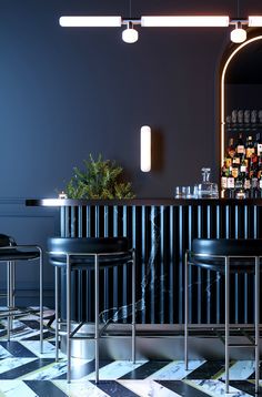 the bar is decorated with black and white checkered flooring, along with three stools