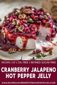 cranberry jalapeno hot pepper jelly cheesecake on a white plate