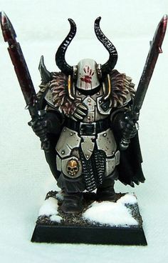 a warhammer with horns and two swords in his hand, standing on snow covered ground