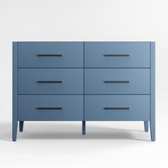 a blue dresser with black handles and drawers