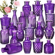 purple glass vases and jars with flowers in them