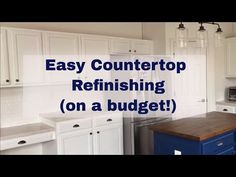 a kitchen with white cabinets and blue island in front of the counter top that says easy countertop refinishing on a budget