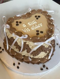 a birthday cake with chocolate frosting and decorations