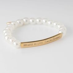 New In Box! Because He Lives Engraved Bracelet. Elegant Faux Pearl Bracelet, Featuring A Charming Gold Engraved Bar Adorned With The Uplifting Words, "Because He Lives I Can Face Tomorrow." A Symbol Of Faith And Resilience, Reminding You That Each New Day Brings Hope And Courage. 6" Elastic Weight: 0.278oz. Stainless Steel Engraved Bar. Plunder Jewelry, Because He Lives, Bracelet Elegant, Faux Pearl Bracelet, Uplifting Words, He Lives, Gold Engraving, Engraved Bracelet, Pearl Bracelet