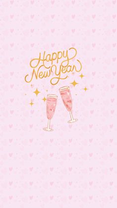 two glasses of champagne with the words happy new year written in gold lettering on a pink background