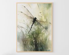 a watercolor painting of a dragonfly sitting on top of a plant in front of a white wall