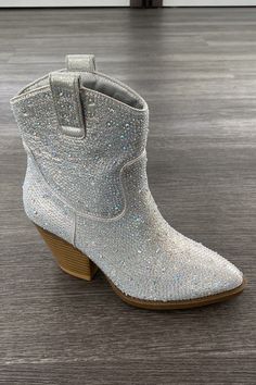 These sparkly crystal rhinestone booties are all about the glitz and glam with touch of western flair. The pull tabs make for an easy to get on fit, as well as the cushioned foot bed makes for a comfortable all day and night long wear. From bachelorette parties to wedding guest, pair these with your favorite dress for a pop of shine! Pretty Bodysuit, Sparkly Boots, Rhinestone Cowgirl, Boho Bags, Boots Women Fashion, Bachelorette Parties, Get The Party Started, Glitz And Glam, Taylor Swift Style