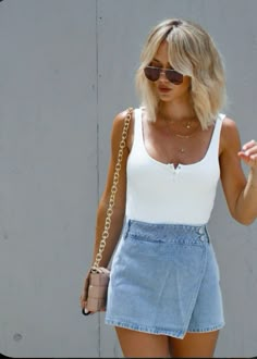 Skirt, jean skort, white tank, denim skort, summer, california babe, beverly hills, sunnies, short blonde hair, summer hair, vacation outfit, trendy hair Chic Shorts, Europe Outfits, Elegante Casual, Ribbed Bodysuit, Summer Fashion Outfits, Cute Summer Outfits, Summer Trends, Spring Summer Outfits, Outfits Casuales