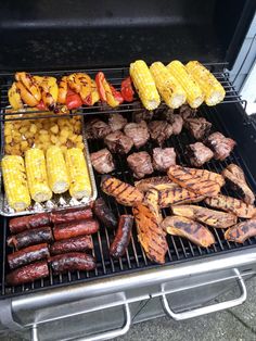 the grill has many different types of food on it