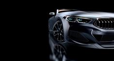 the new bmw concept car is shown in this image from an angle view, with its headlights