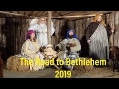 three men and two women dressed up as the nativity scene with text overlay