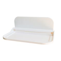 an empty white tray with a wooden handle