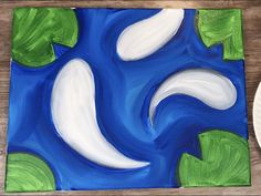 an acrylic painting of white and green leaves on a blue background with a plate next to it