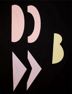 an abstract painting with different shapes and colors on black paper, including the letter b