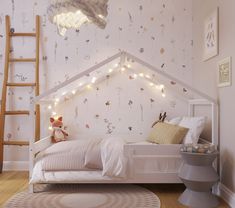 a child's bedroom decorated in pink and white with lights strung from the ceiling