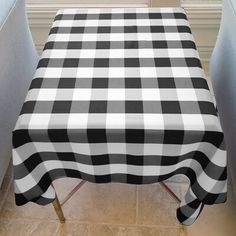 a black and white checkered table cloth on a chair