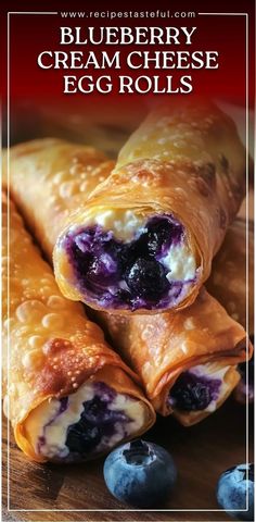 blueberry cream cheese egg rolls on a cutting board