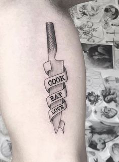 a black and white tattoo with the words cook eat love on it