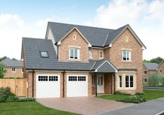 a two story brick house with three garages on the front and one car door