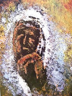 an image of a face in the middle of some paint and water on a piece of paper