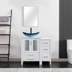 a bathroom vanity with a blue bowl sink