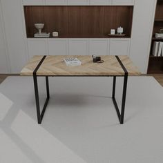 a wooden table sitting on top of a white rug in front of a bookshelf