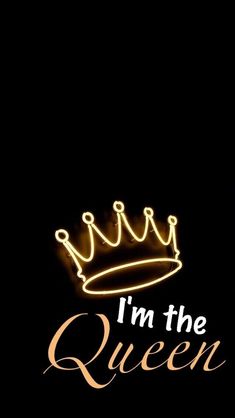 the words i'm the queen are lit up against a black background with a gold crown