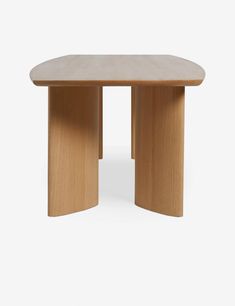 a wooden table with two curved legs