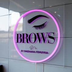 a neon sign with the words brows on it