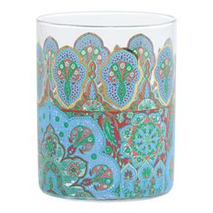 a glass vase with colorful designs on it